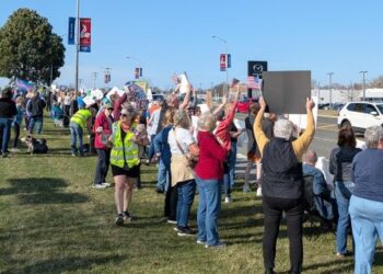 Hundreds Protest Elon Musk and President Trump at Libertyville Tesla Dealership